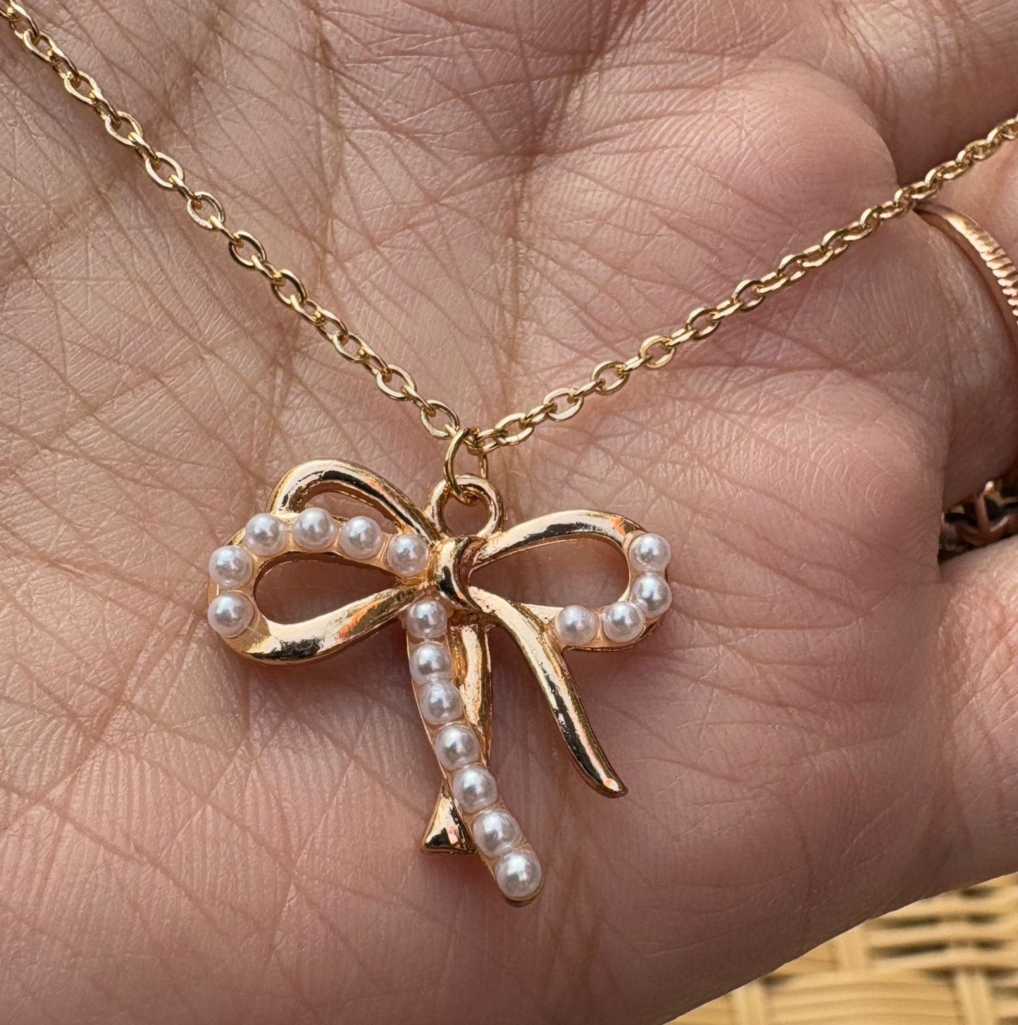 Luminous Ribbon Knot Pendant