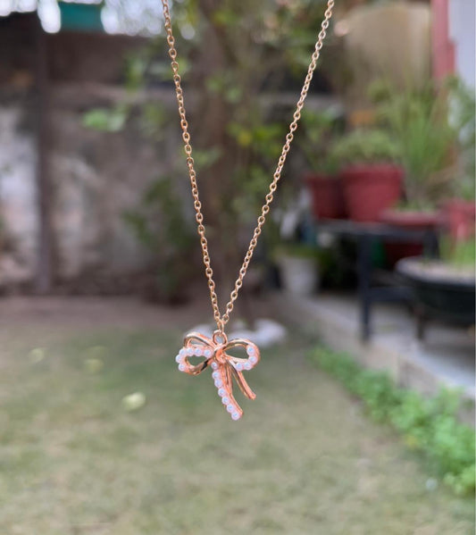 Luminous Ribbon Knot Pendant